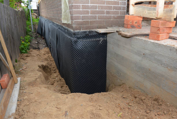 SJ Waterproofing Pros technician performing targeted Waterproofing assessment in Plymouth, NC